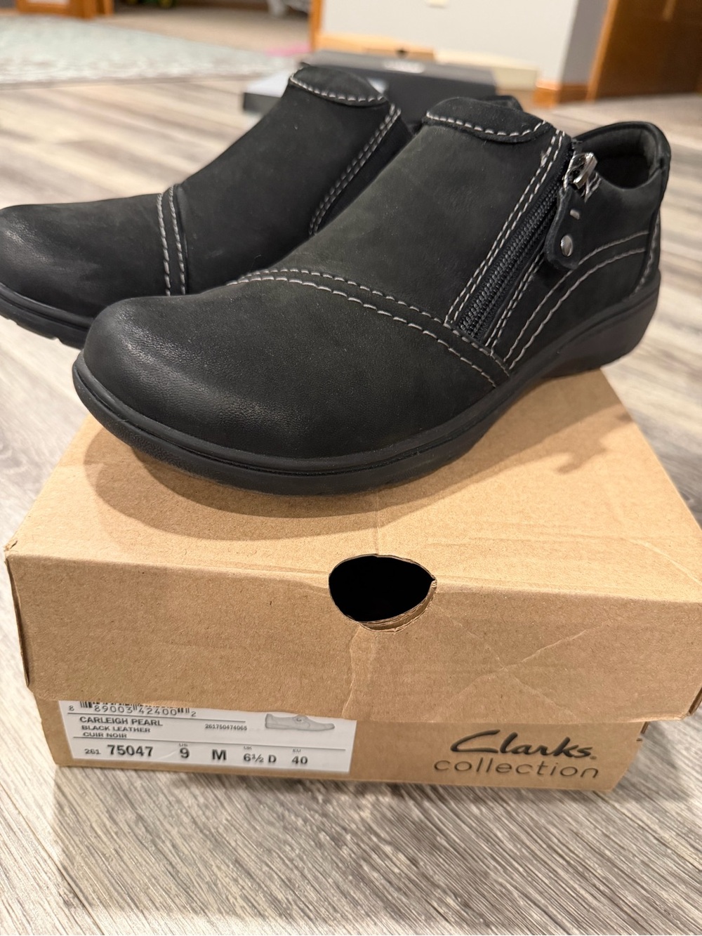 Clarks Black Women's Slip-On Zip Loafers with Contrast Stitching
